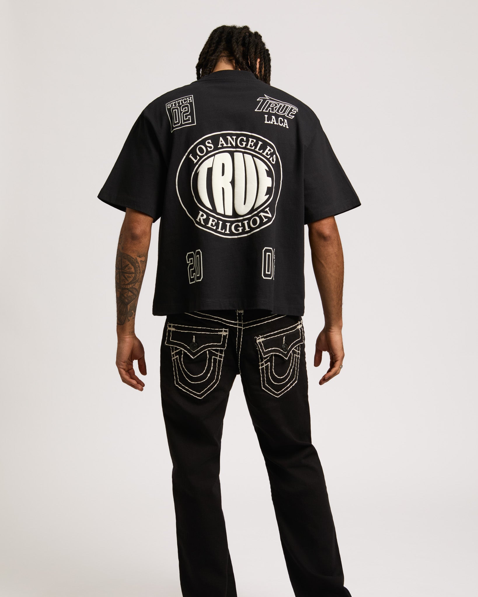 SS PRINT MESH STACKED LOGO TEE - JET BLACK
